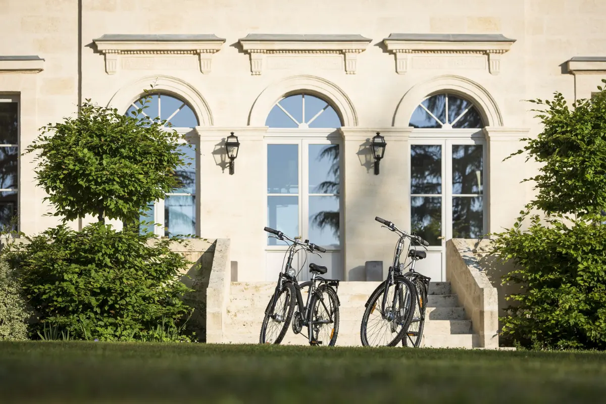 The chartreuse at Haut-Bailly with bicycles outside, Leognan