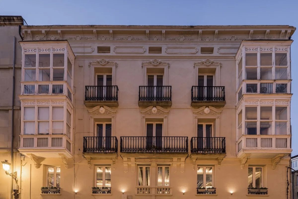 Balconied townhouse facade of Wine and Soul Suites in the old town of Haro