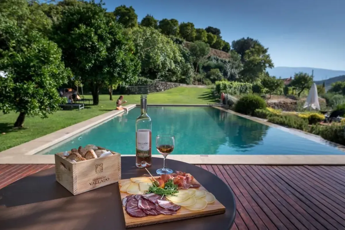 Outdoor pool on the garden lawn at Quinta do Vallado near Peso da Régua