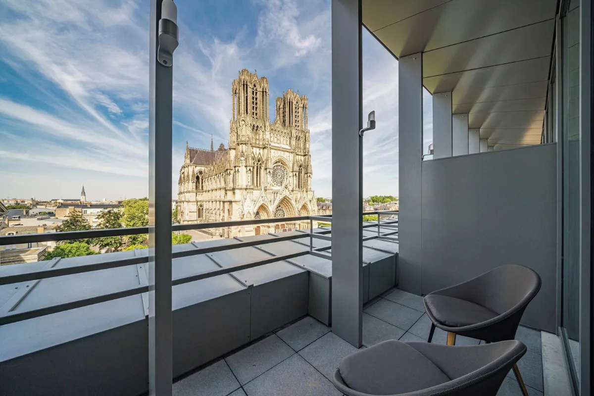Balcony at La Caserne Chanzy looking straight at the towers of Reims cathedral