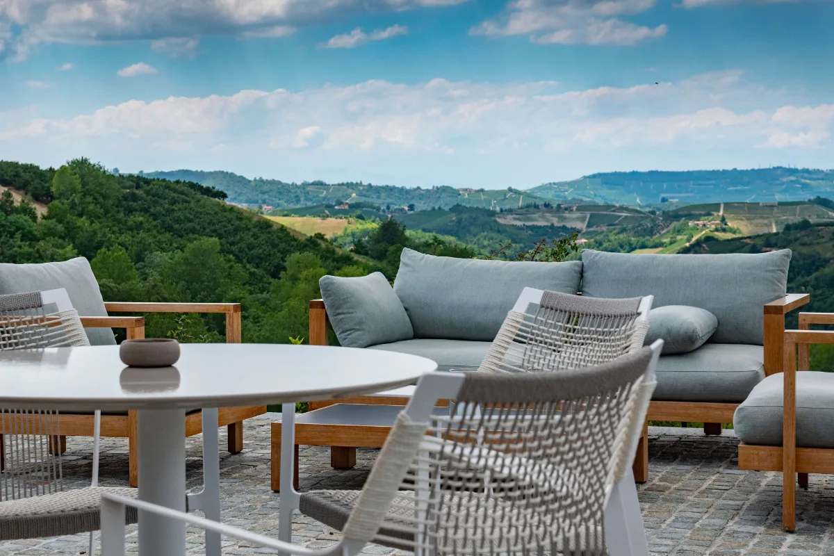Terrace lounge at Casa di Langa looking over green Langhe hills